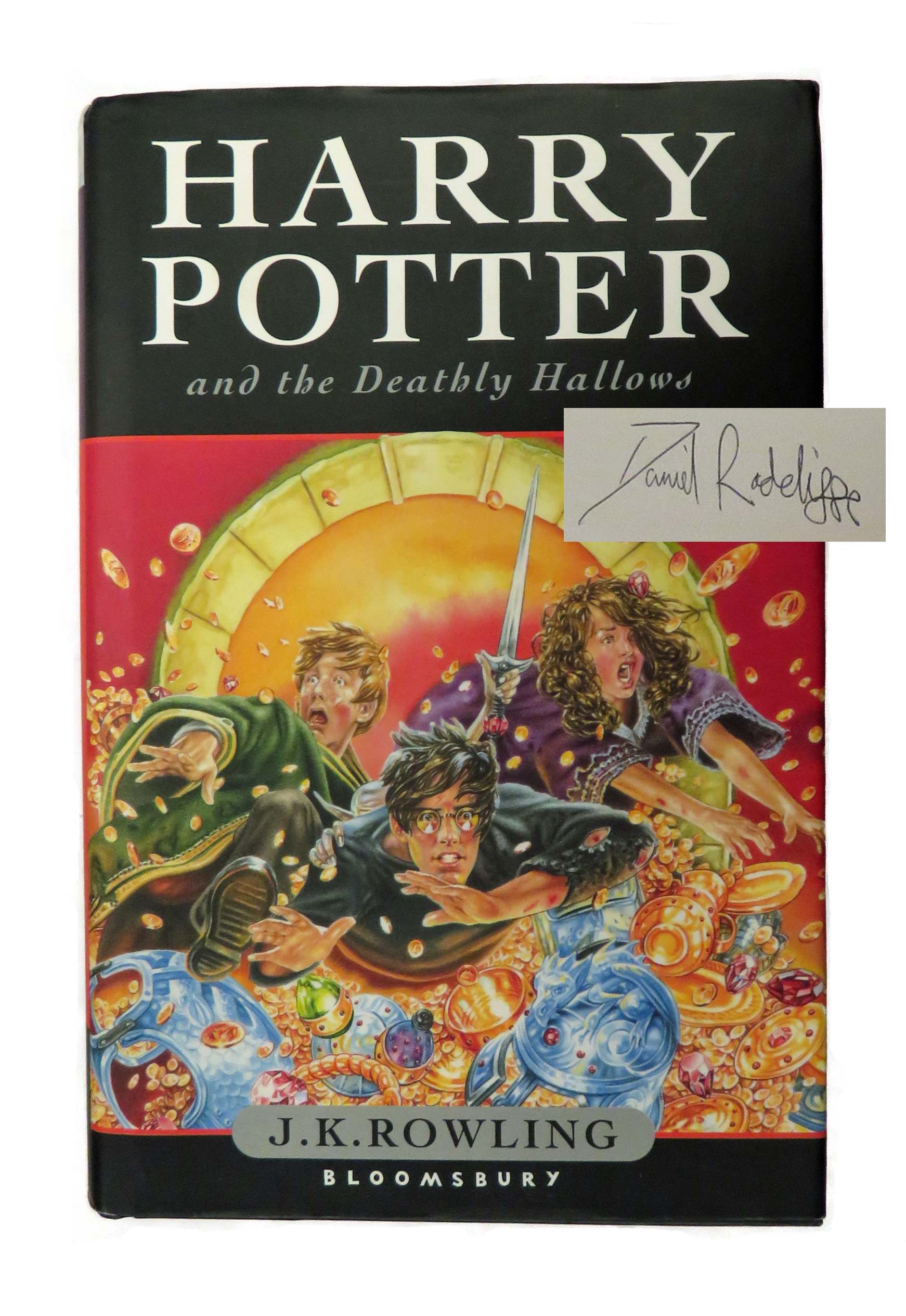 Harry Potter and the Deathly Hallows SIGNED by Daniel Radcliffe and other Cast Members