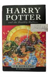 Harry Potter and the Deathly Hallows SIGNED by Daniel Radcliffe and other Cast Members